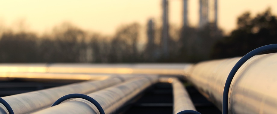 bigstock-Steel-Pipes-In-Crude-Oil-Facto-64167577.jpg
